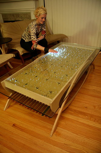 Illustration for article titled The Wave LED Coffee Table Provides Motion-Seeking Light Show
